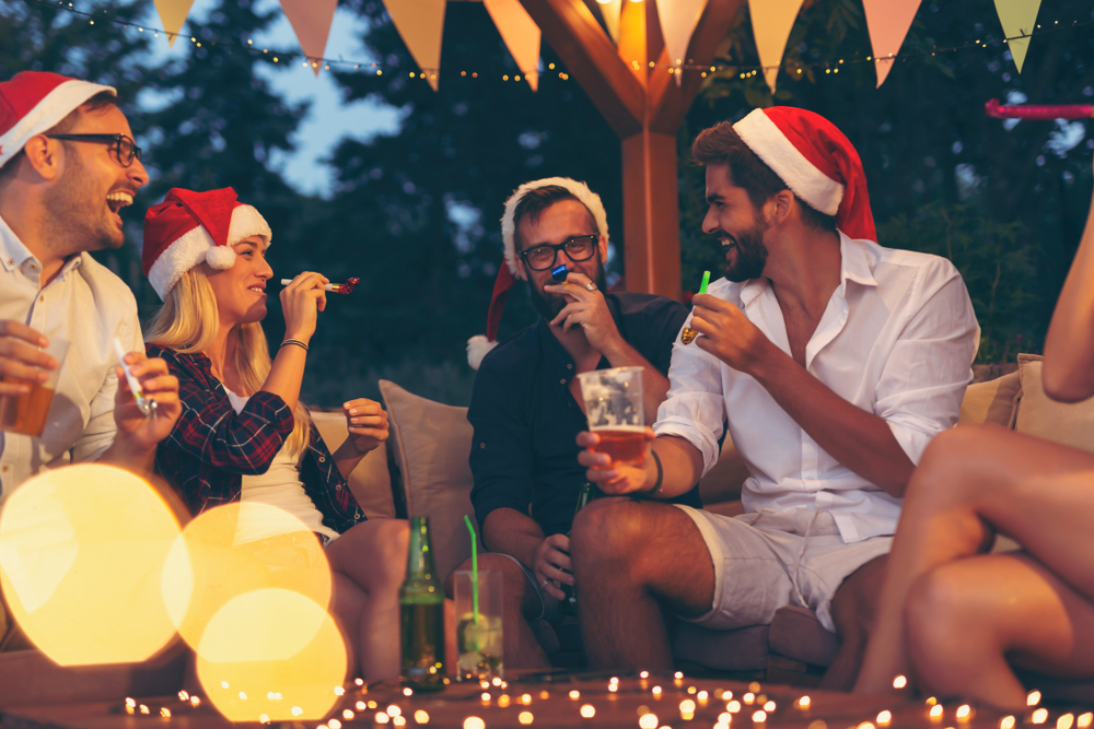 Host Your Holiday Party Outdoors With A Festive Backyard