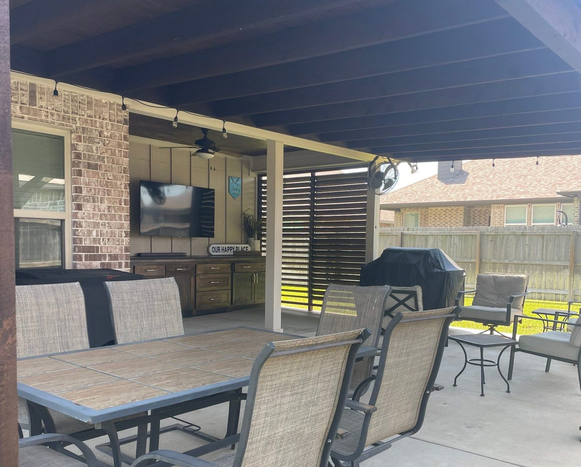 2025 outdoor living trends to watch college station, tx | h3 outdoor design & construction a Custom Patio with an Outdoor Dining Area