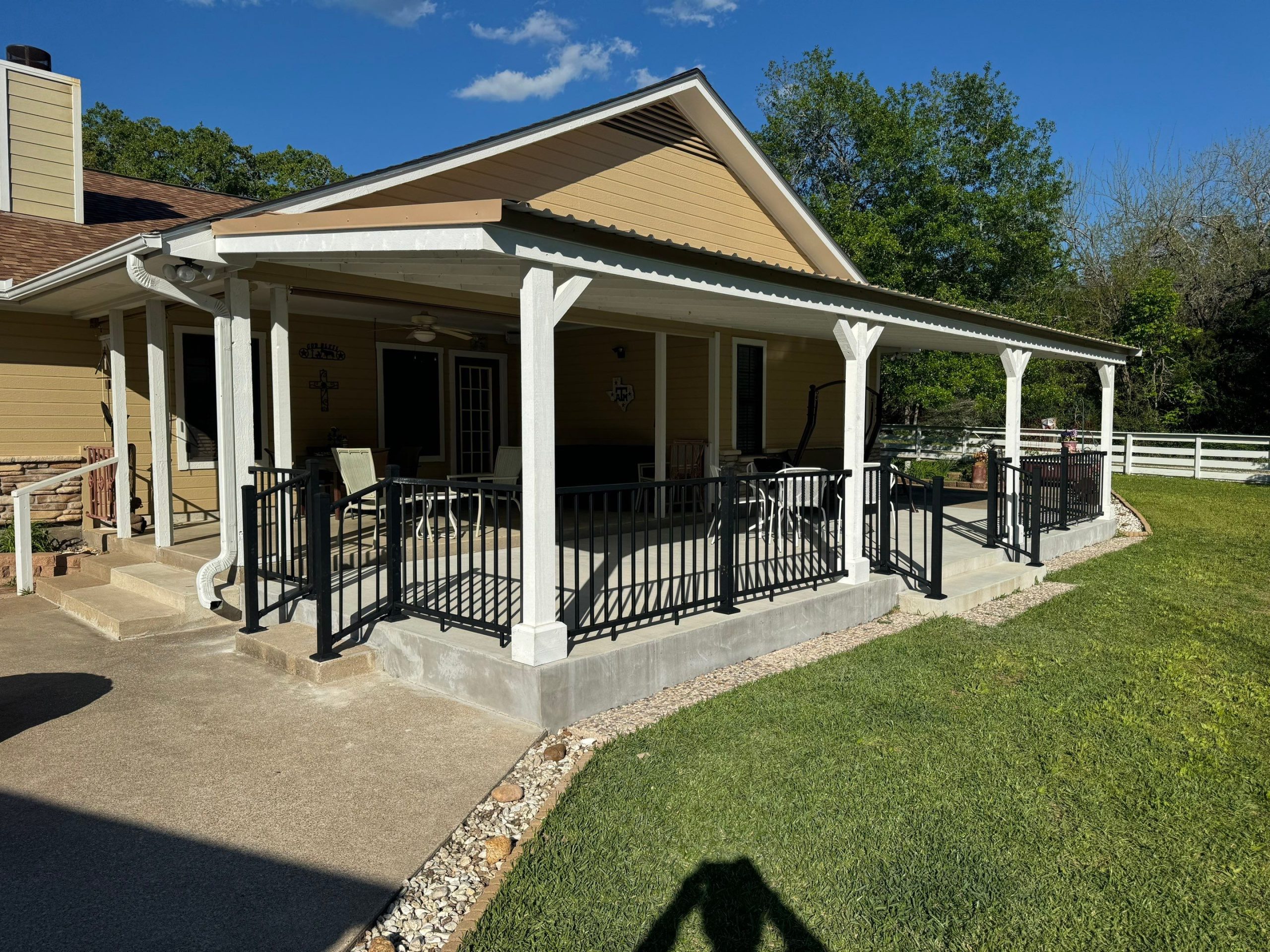 Custom Farmhouse Style Covered Patio in College Station Tx by H3 Outdoor Design