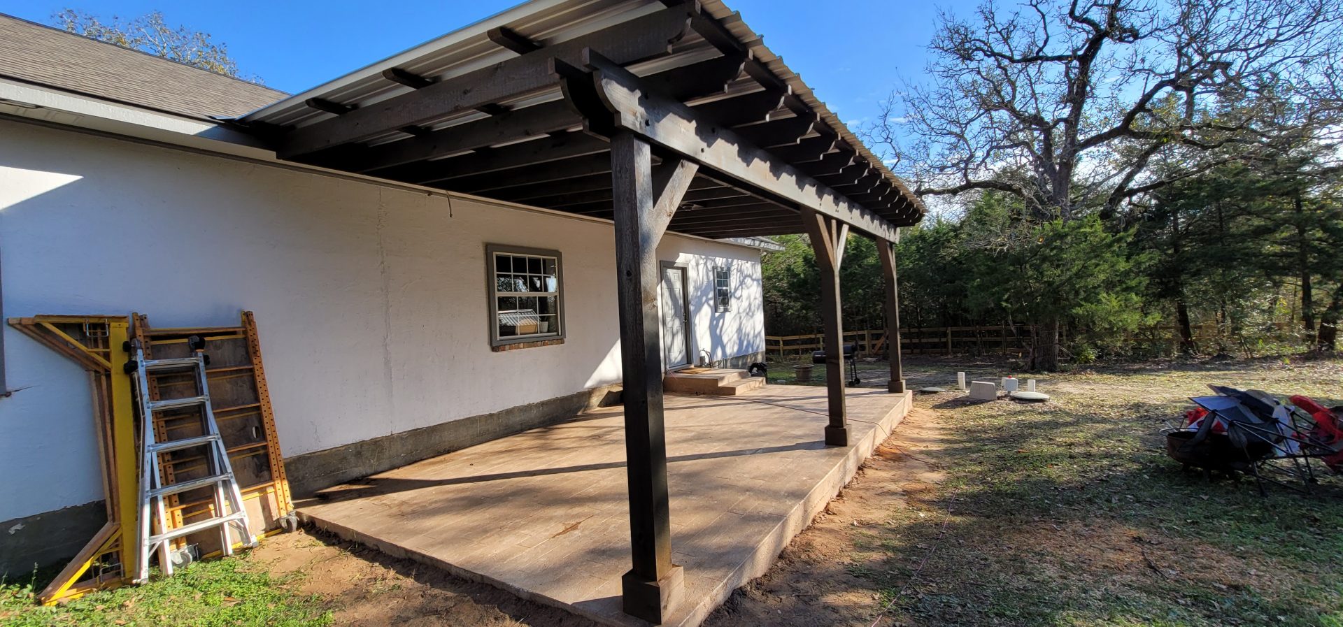 Awning and Stamped Concrete Slab