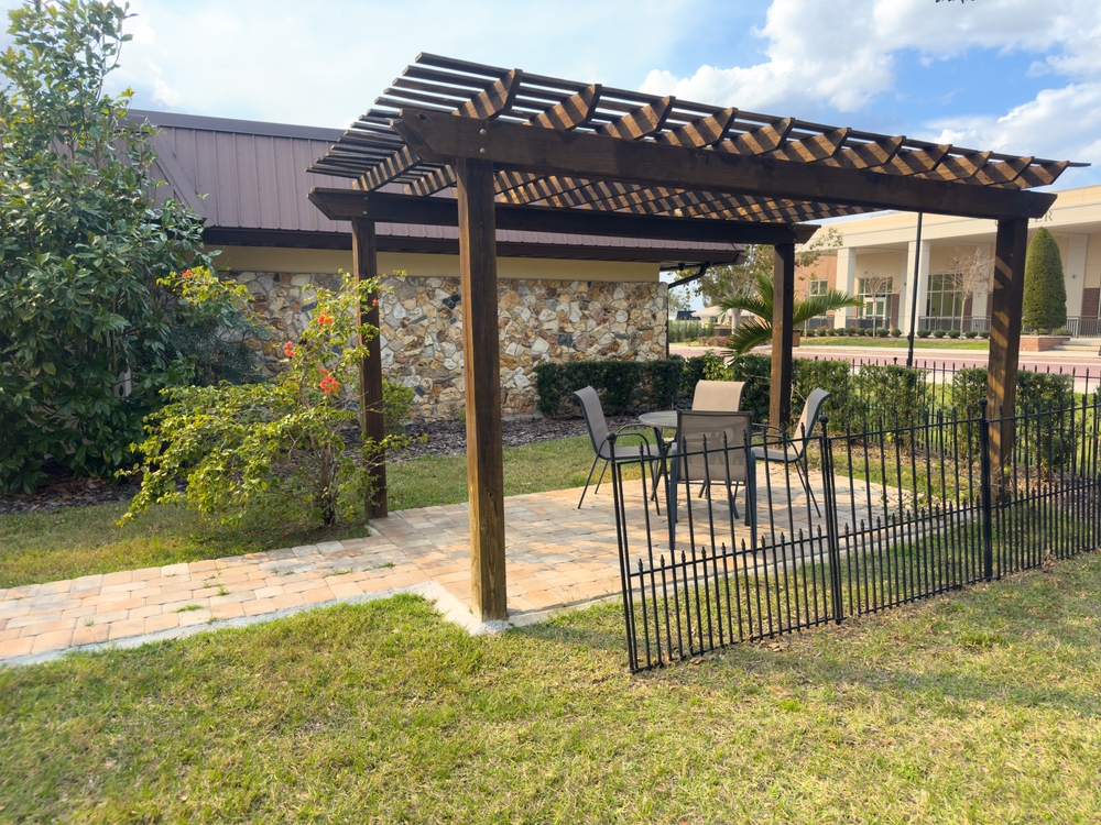 Wooden Pergola with a Lattice Covered Roof, Open Sides for Sun Shade.