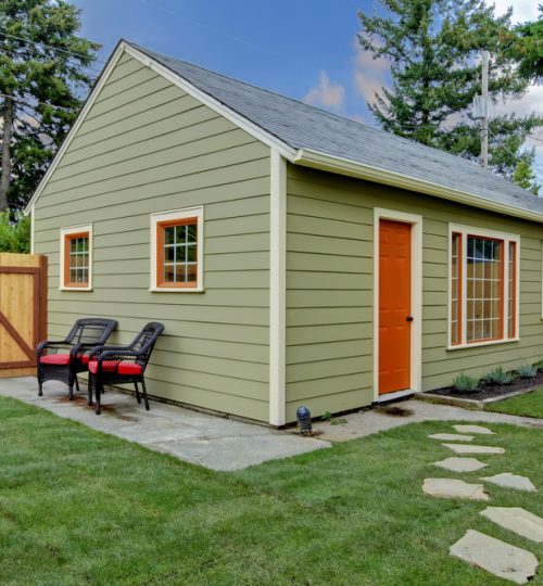Small,Green,And,Orange,Guest,House,In,The,Back,Yard